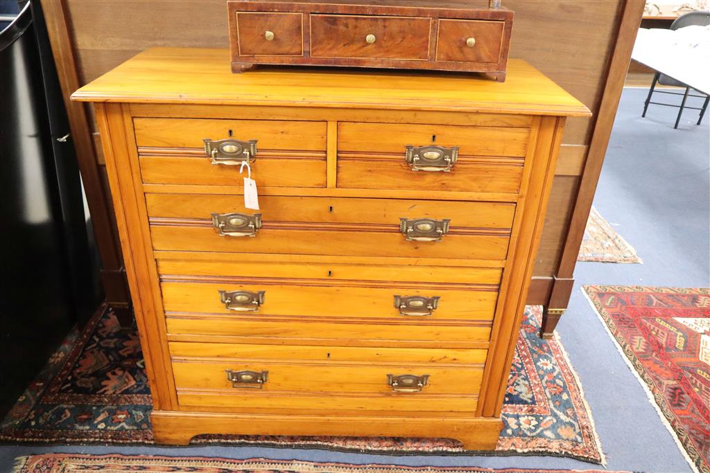 A late Victorian satin walnut chest, width 106cm, depth 49cm, height 104cm